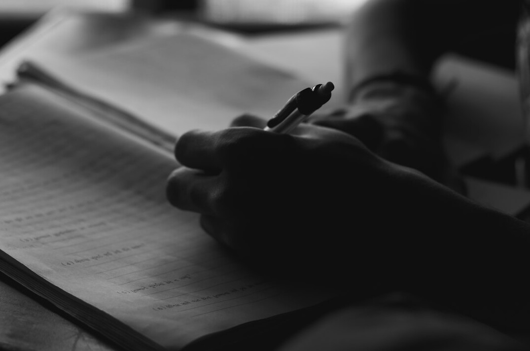 woman journaling in morning