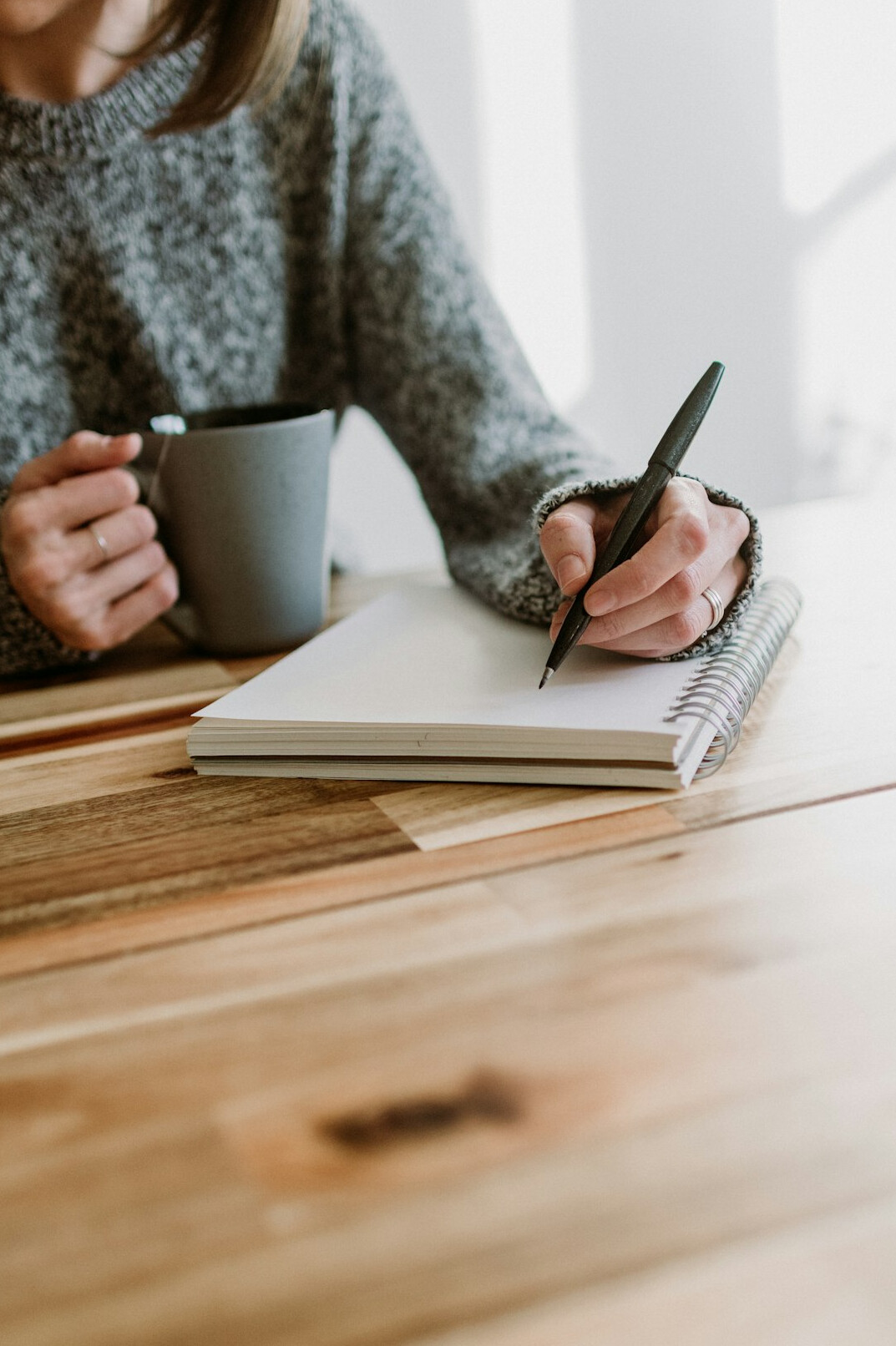person writing goals