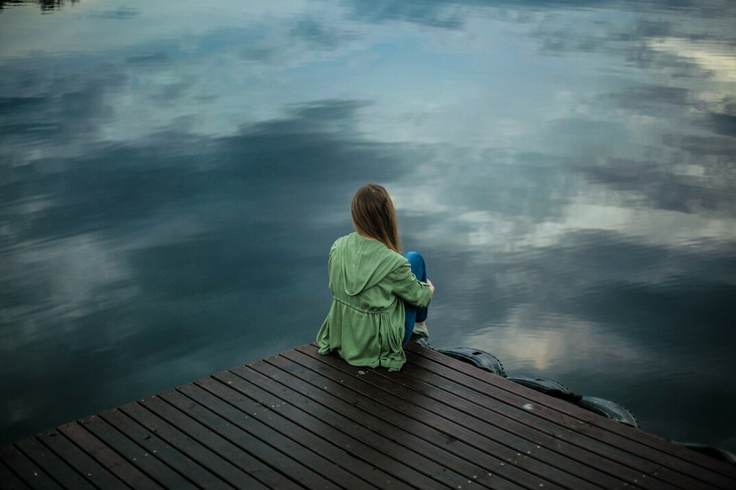 person reflecting alone