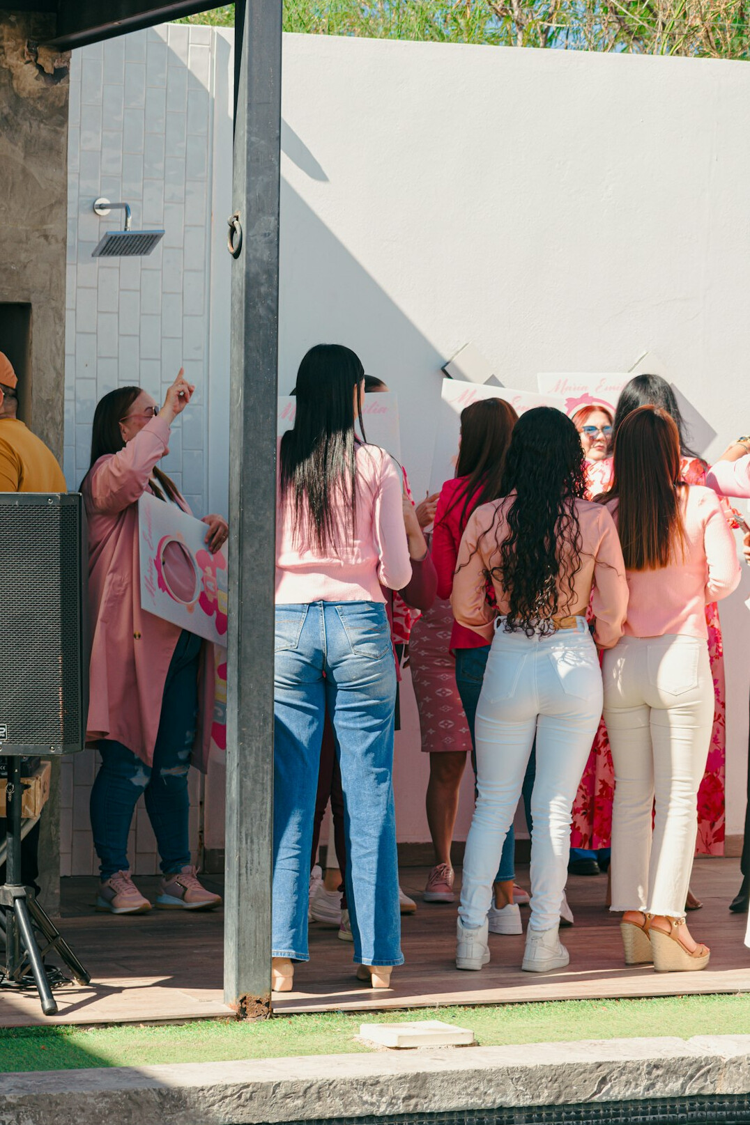Brazilian woman presenting ideas to a small group