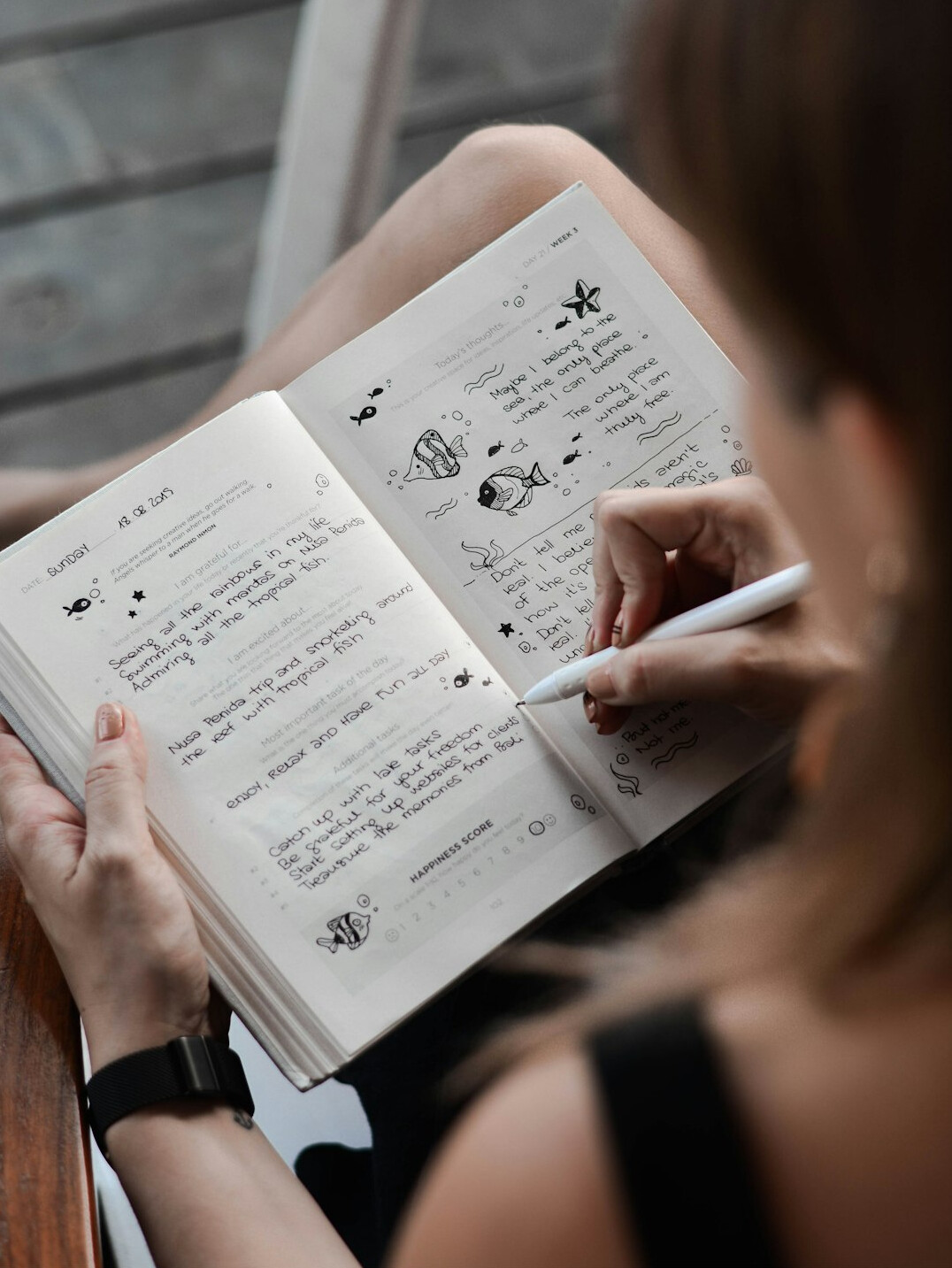 person journaling thoughts